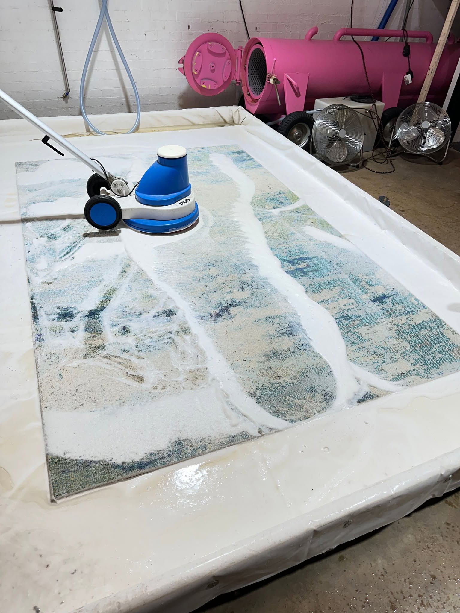 Professional rug washing machine and pink centrifuge at Rug Cleaner Scotland